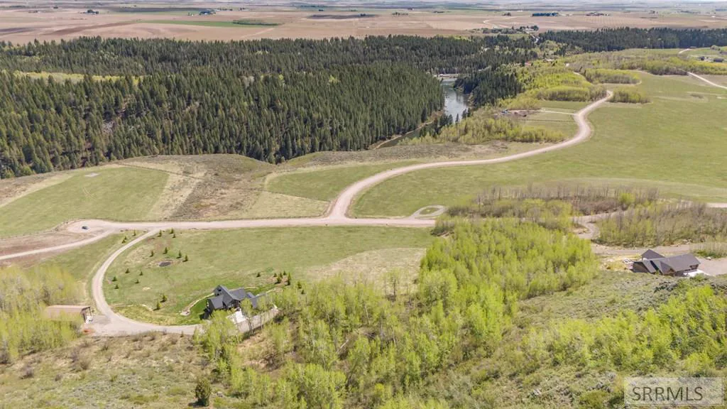 Aerial of the broader Twin Rivers Ranch area, river visible.